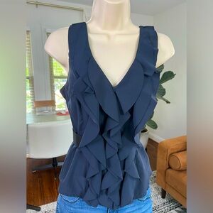 Size small navy blue blouse with ruffled design and black built in belt